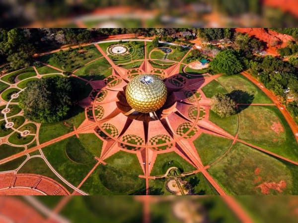 drone view of lush green auroville township in pondicherry