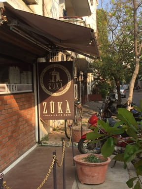 variety of cakes and pastries displayed at zuka, heritage town