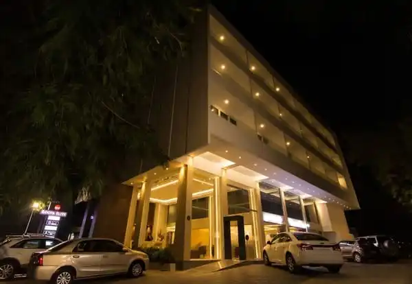 Exterior night shot of a modern looking hotel