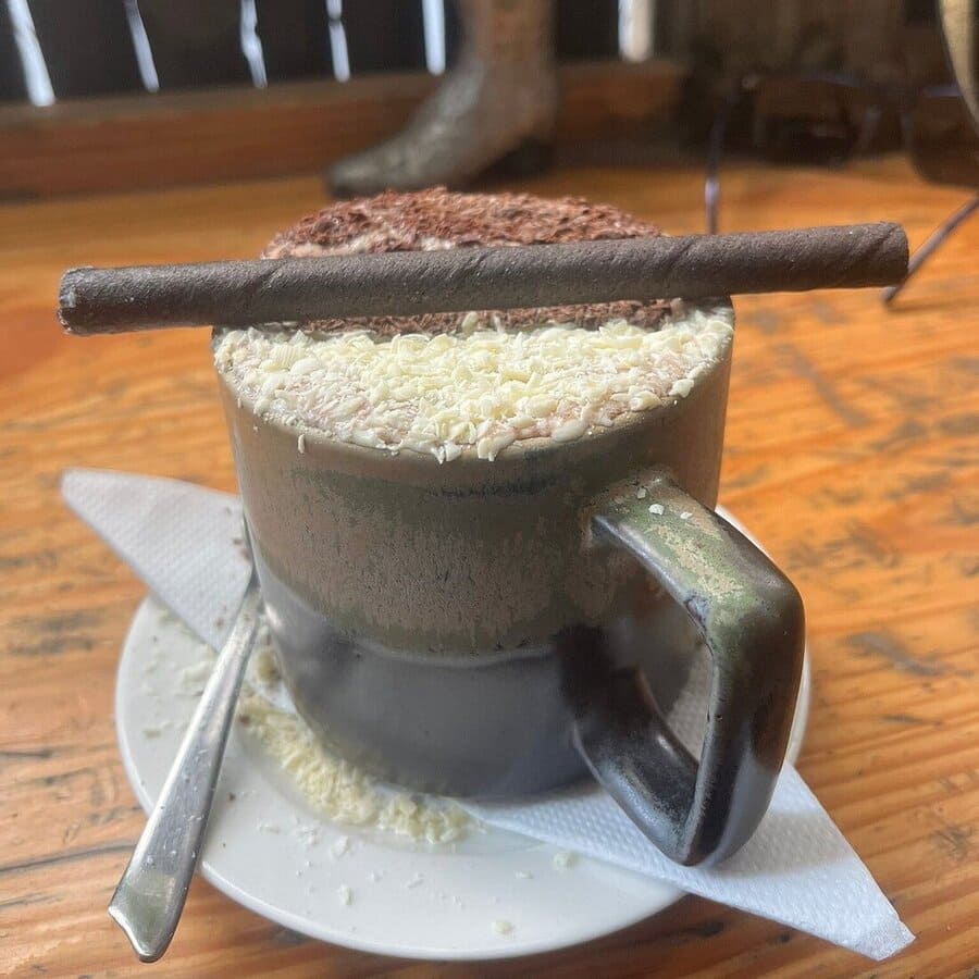 Hot chocolate with white chocolate on top.