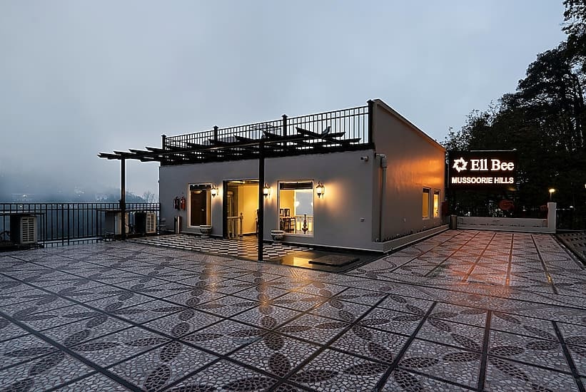 Hotel building close to clouds