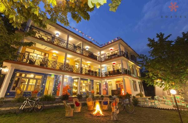 bonfire in common area of zostel in old manali
