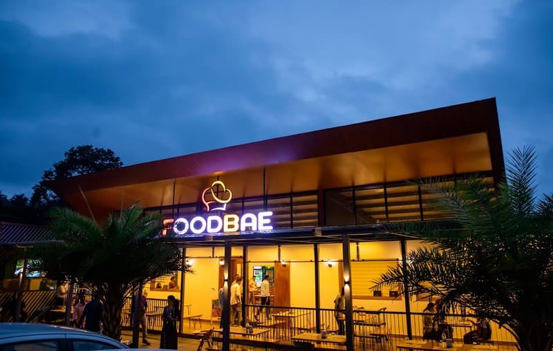 Mid class restaurant exterior with sign board